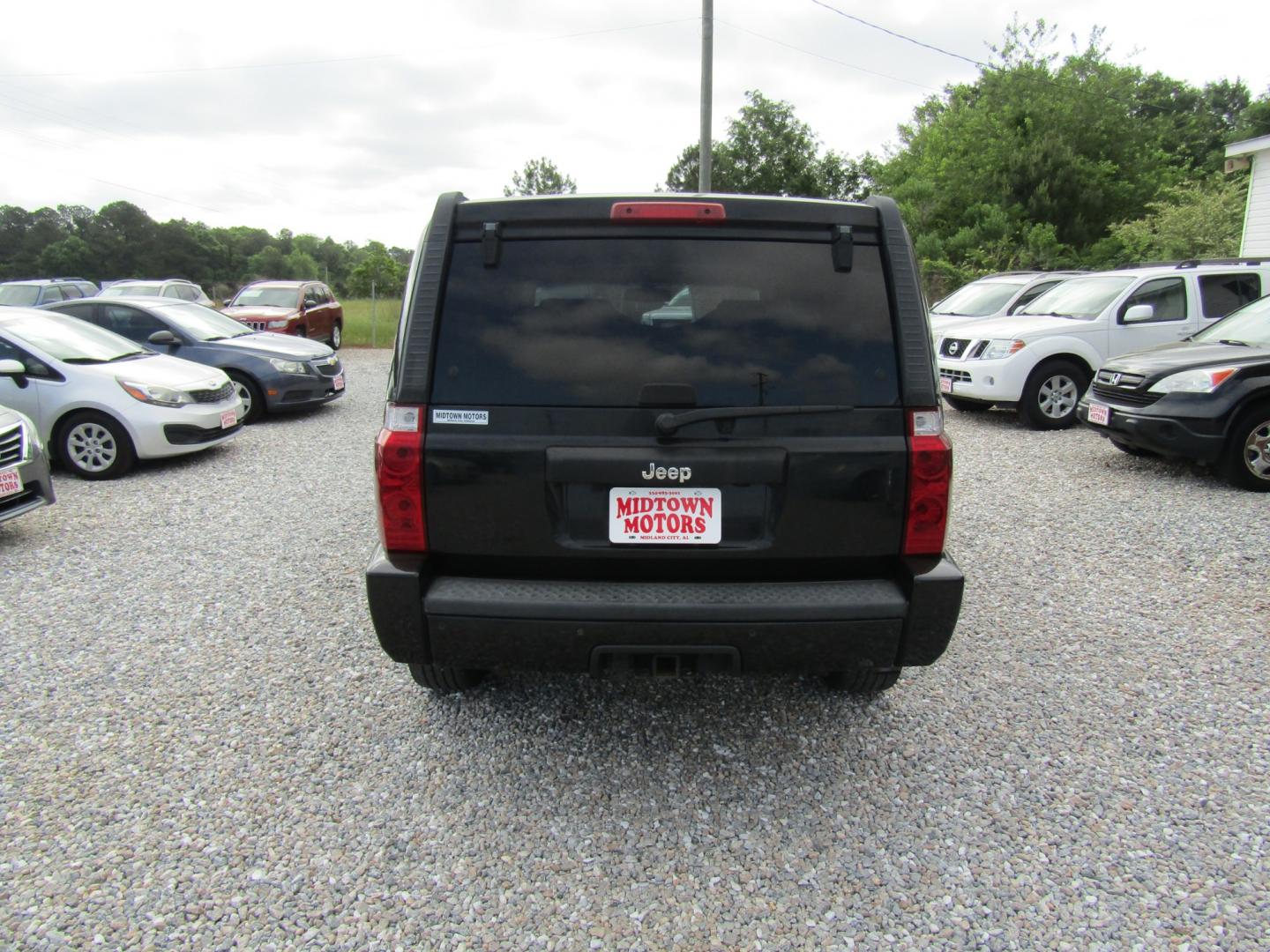 2007 Black /Gray Jeep Commander Sport 2WD (1J8HH48P37C) with an 4.7L V8 SOHC 16V FFV engine, Automatic transmission, located at 15016 S Hwy 231, Midland City, AL, 36350, (334) 983-3001, 31.306210, -85.495277 - Photo#6